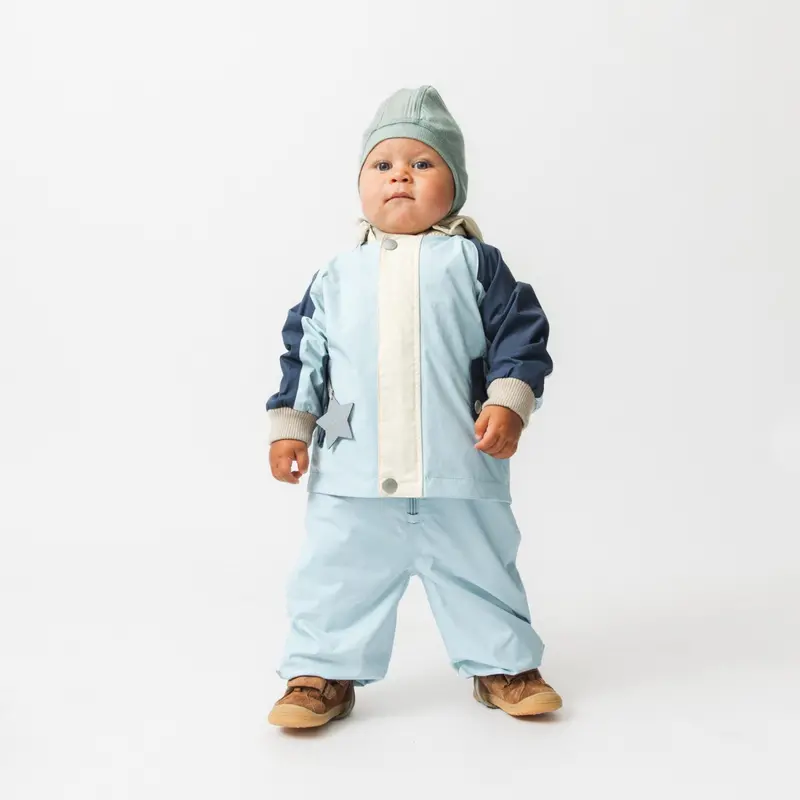 Mini A Ture Cloud Blue Col. B. Matwally Jacket. Grs 6
