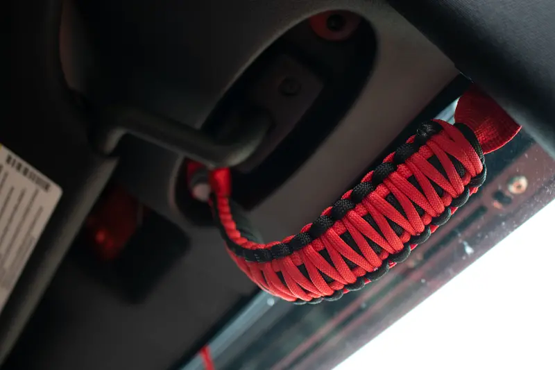 Fishbone Offroad 07-18 Wrangler Jk A Pillar Sound Bar Red Paracord Grab Handles 1